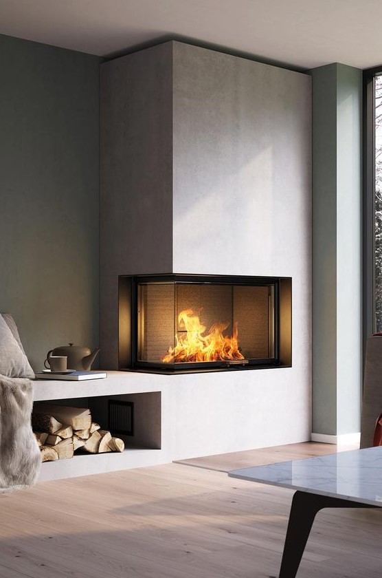 a contemporary built-in fireplace in neutrals with a glass cover and a firewood storage space is a stylish decoration