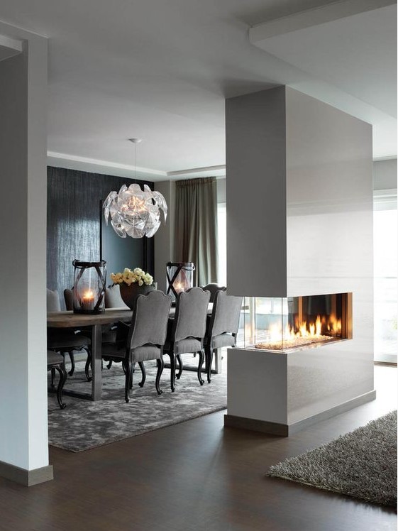 a sleek white minimalist double-sided fireplace will give a chic look to the space and make it cozy