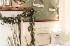 evergreens, pinecones, branches, wood and lots of lights make this little nook very cozy and very welcoming