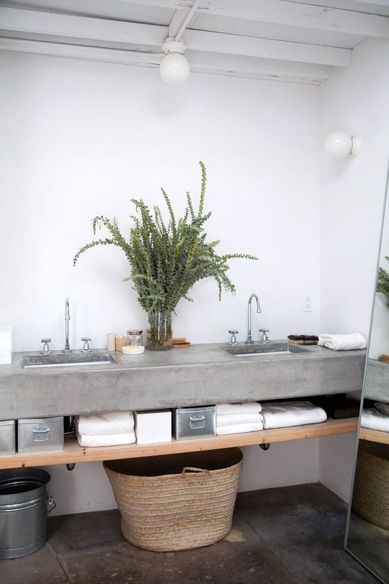 concrete furniture is a great addition to a rustic bathroom