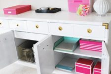 a comfortable cabinet with closed storage departments and drawers where you can hide anything you want
