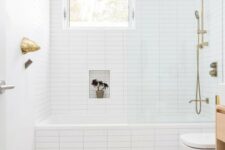 a stylish bathroom with mosaic floor tiles
