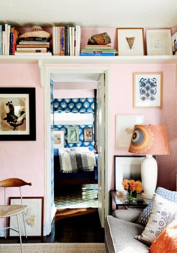 a long shelf over the doorway is a cool idea to store some things and display them and to avoid cluttering the room at the same time