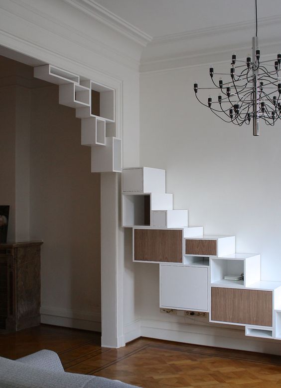 creative contemporary wall and doorway styling with minimalist open and closed shelves running upwards is a cool idea for storage in a whimsy way