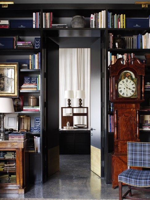 doorway storage shelves with books, art, clocks and other stuff is a lovely idea to store a lot of things and display them at their best