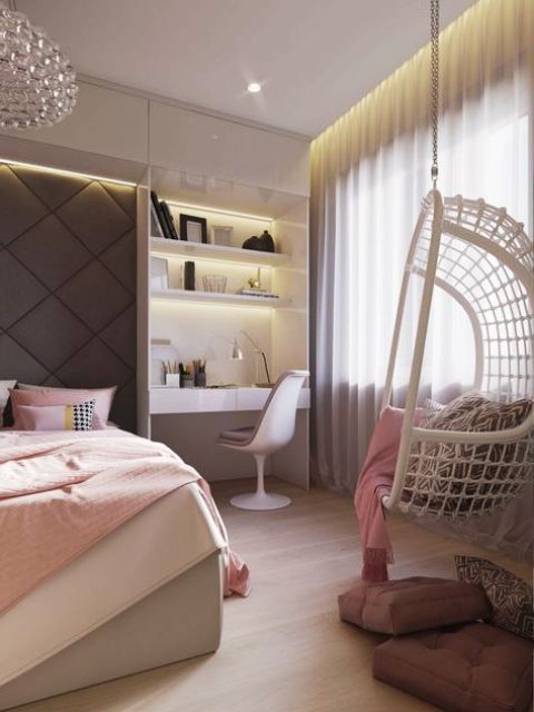 a subtle white, pink and grey teen girl bedroom with built in lights, a pendant chair and soft pink textiles