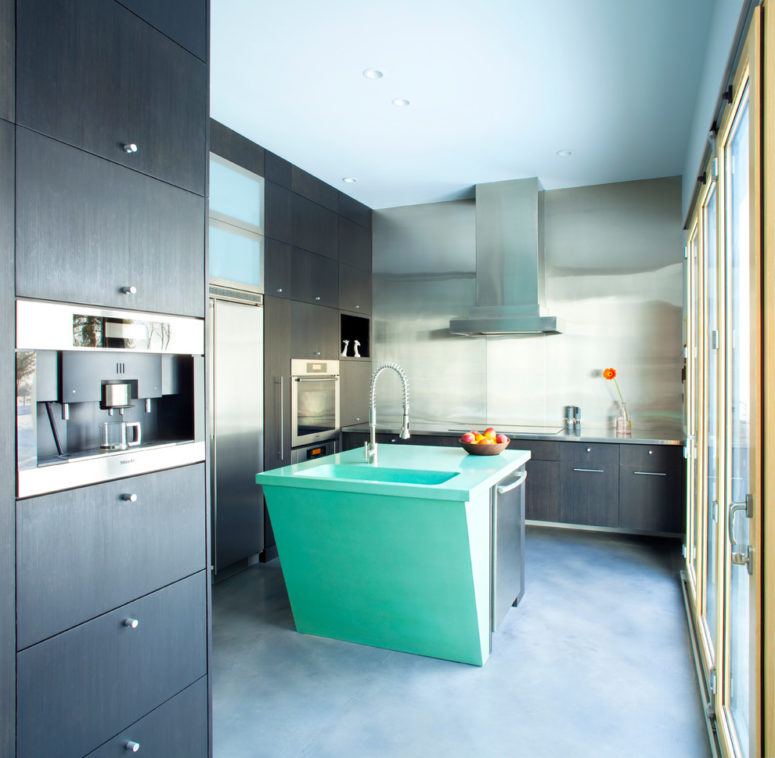 A modern geometric kitchen island with a built-in dishwasher definitely can make an accent. (Mindful Designs, Inc.)