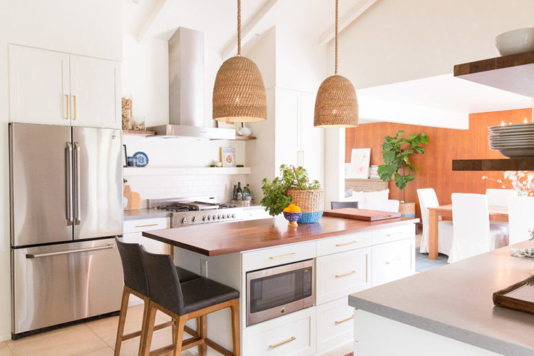 A microwave can become a  practical part of a kitchen island.