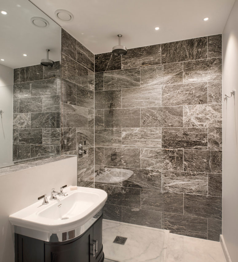 marble-like tiles is a luxurious choice for a walk-in shower (London Basement)