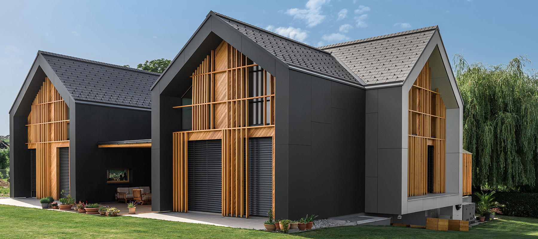 All Black House Design Of Three Gabled Volumes DigsDigs