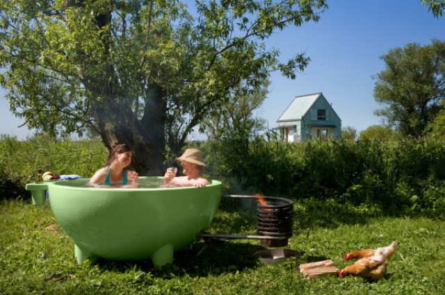 Haul the tub to a desired location, set a fire, and enjoy the bathing experience