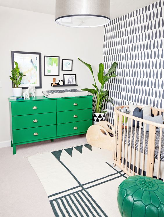 bold green chaging station with a gallery wall over it
