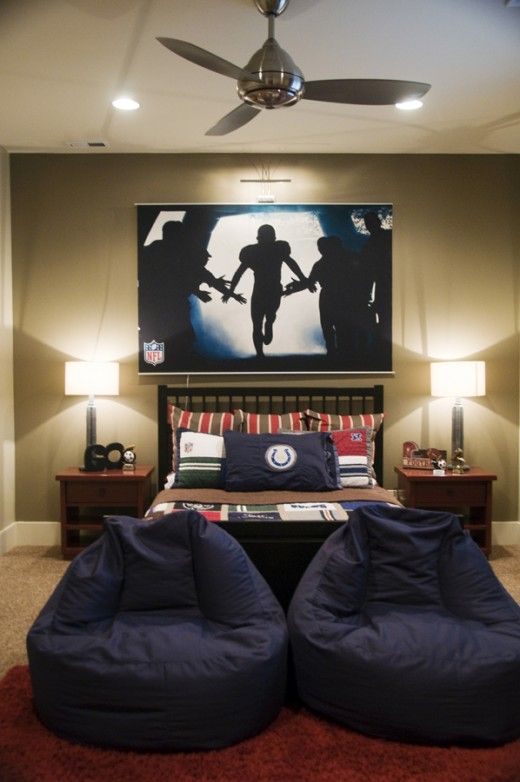 sport-inspired bedroom with an oversized artwork above the bed