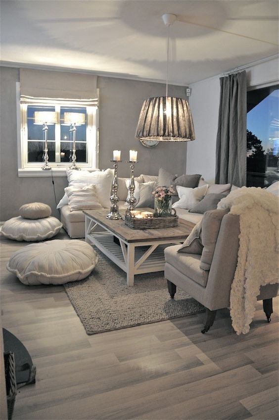 grey planked woode floors in a monochromatic living room