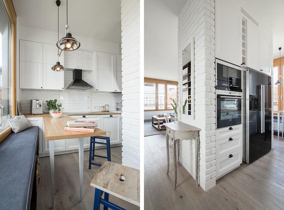 The kitchen is tiny, and the worktop is extended to make a dining table by the window seat