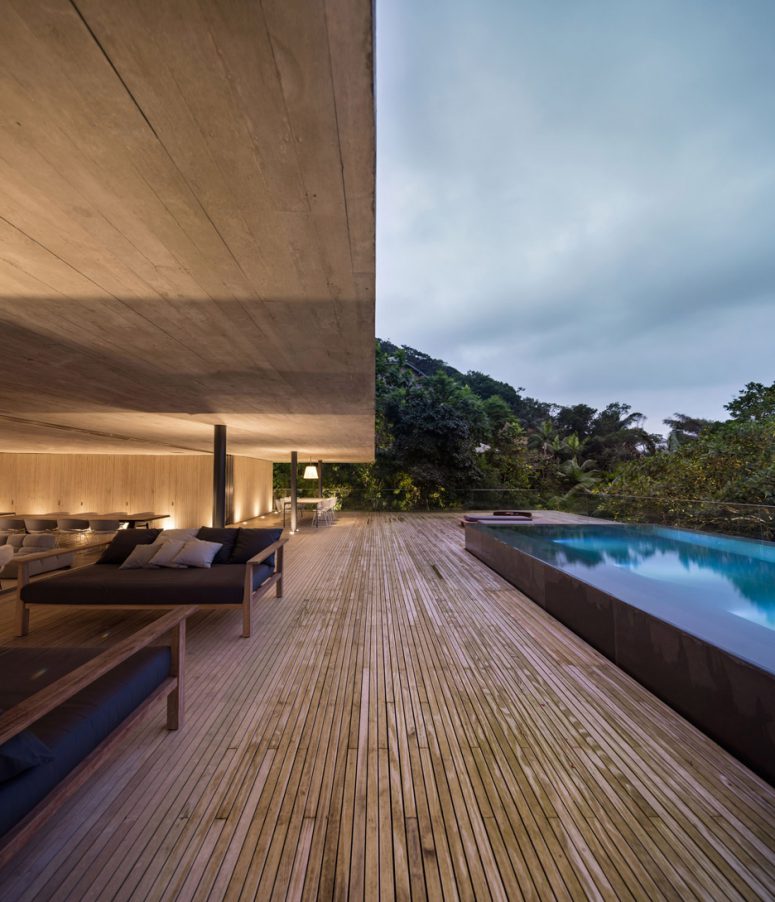 The wooden deck is a shaded play area for the kids