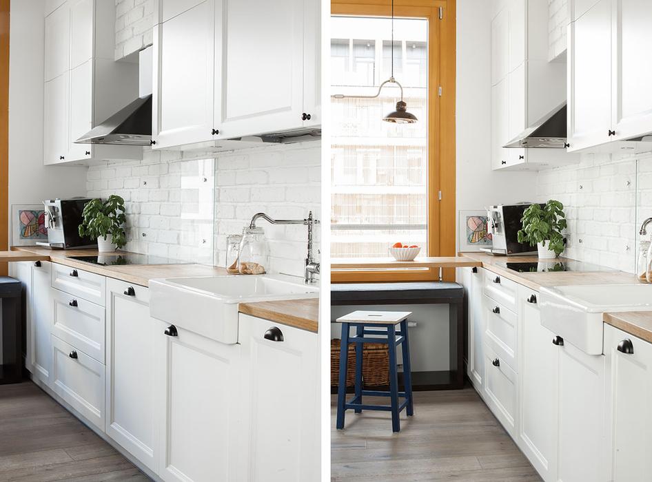 05 The kitchen cabinets are white ones with a mid-century modern feel