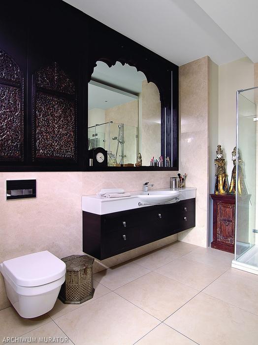 A piece of Indian gate is put on the wall as decor