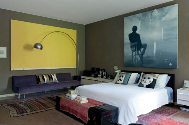 The master bedroom features a sofa designed by George Nelson, Arco lamp (1962) and works of art of Carlo Benvenuto and Marco Montesano The master bedroom features a sofa designed by George Nelson, Arco lamp (1962) and works of art of Carlo Benvenuto and Marco Montesano