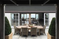 08 The patio can boast of a cool dining space with woven furniture