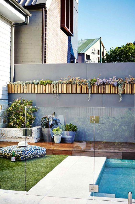 30 Stylish And Practical Pool Fence Designs - DigsDigs
