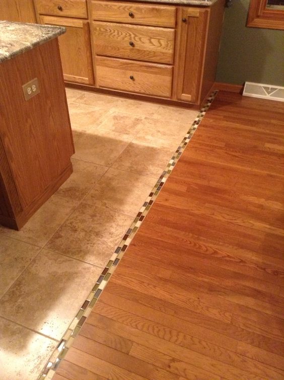 09 Mosaic tile transition between hardwood and tile floor