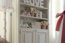 09 The Bookcase looks vintage and chic with its pink trim and hand-carved edges