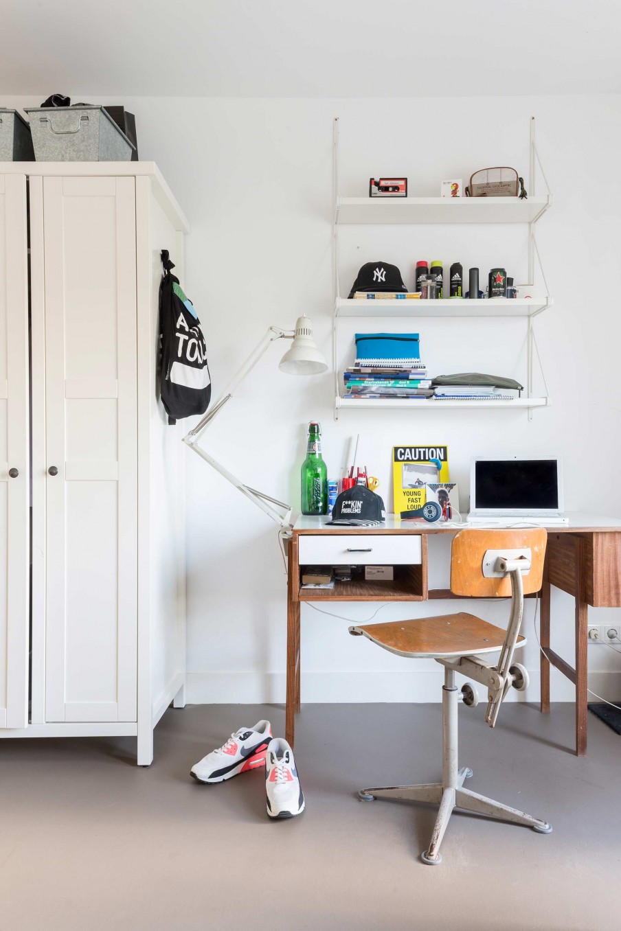 The home office corner is mid-century modern with shabby furniture