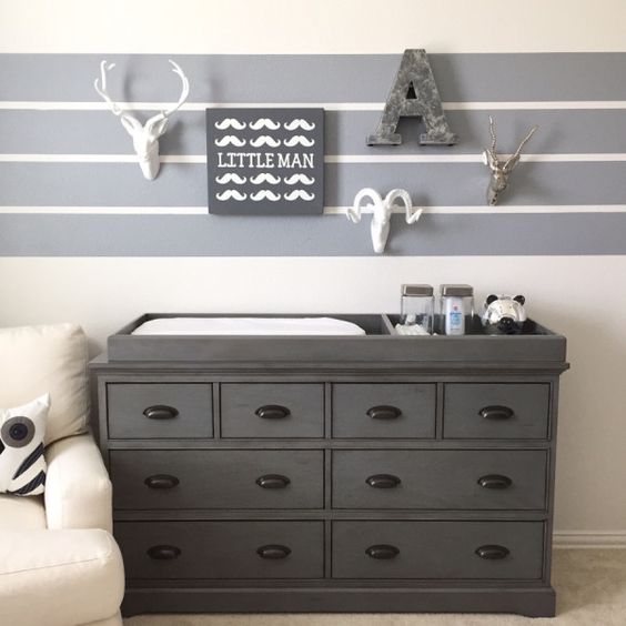 stylish grey changing station for a little boy