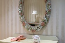 10 If you are decorating a nursery, you’ll need this changing table and a mirror above it