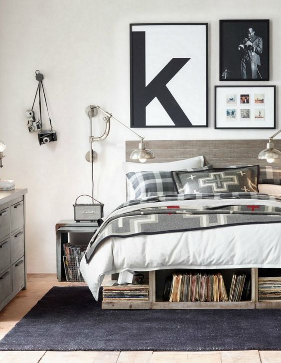 10 industrial sleeping zone with a reclaimed wood bed and steel sconces