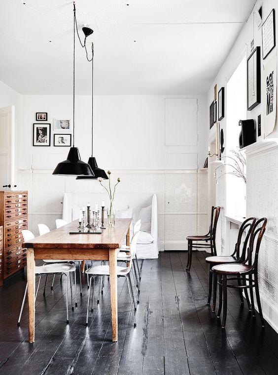 shabby black wood plank floors are perfect for a Scandinavian space