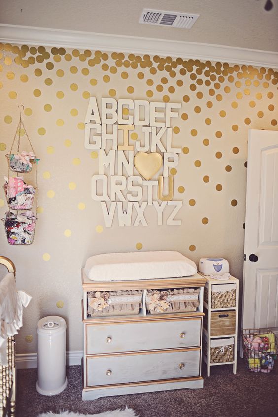 white and gold changing table