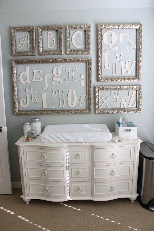 elegant changing station with framed letters art