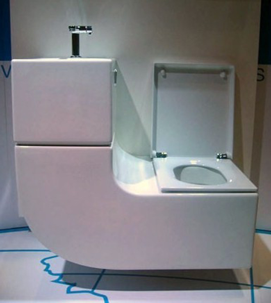 sleek curved sink+toilet combo