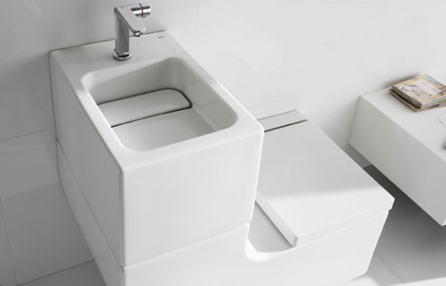 stylish curved white sink and toilet combo