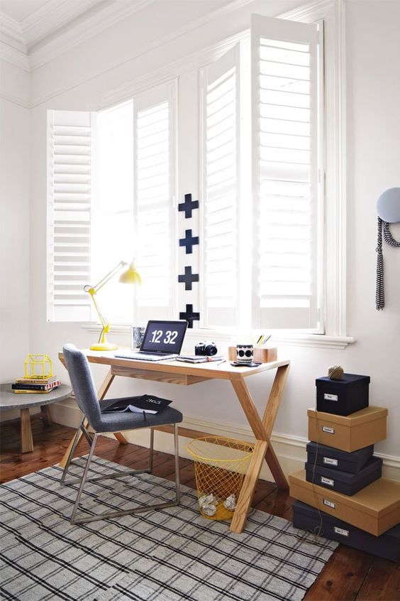 modern study space with a wooden desk and bold touches