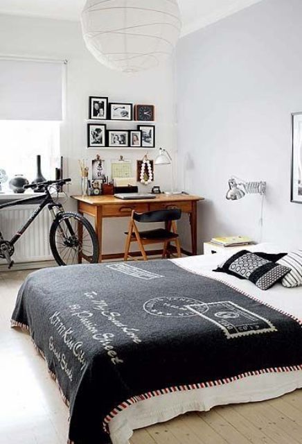 corner study area with a wooden desk and a leather chair
