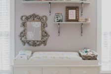 18 white changing table with storage shelves above it