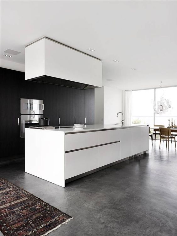 grey concrete floors are perfect for any kitchendue to their functionality