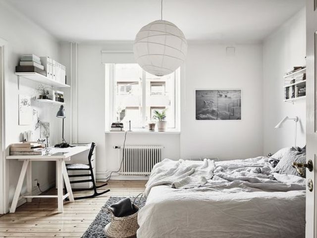 24 neutral bedroom with a white desk and a black chair for a contrast