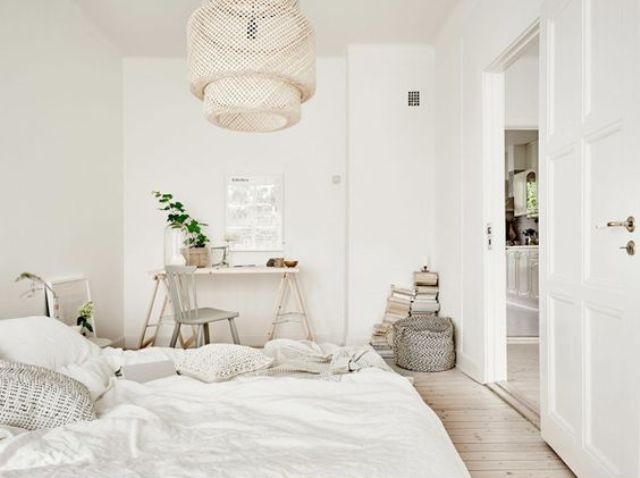 neutral bedroom with a white rustic desk