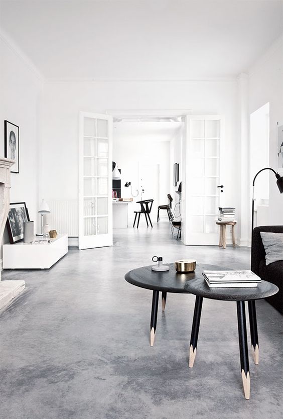 polished concrete floors look perfect in this Scandinavian living room