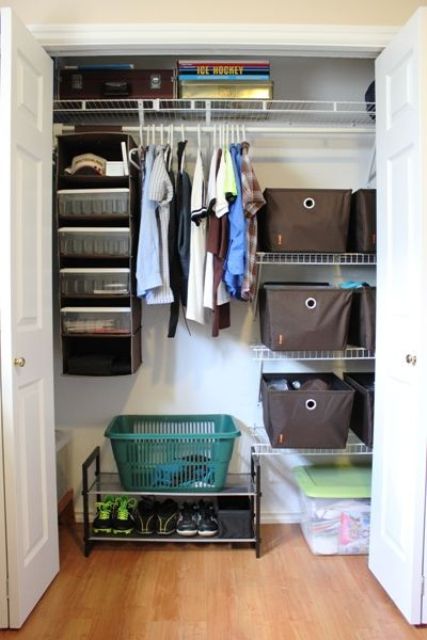 well-organized closet in a teen boy room
