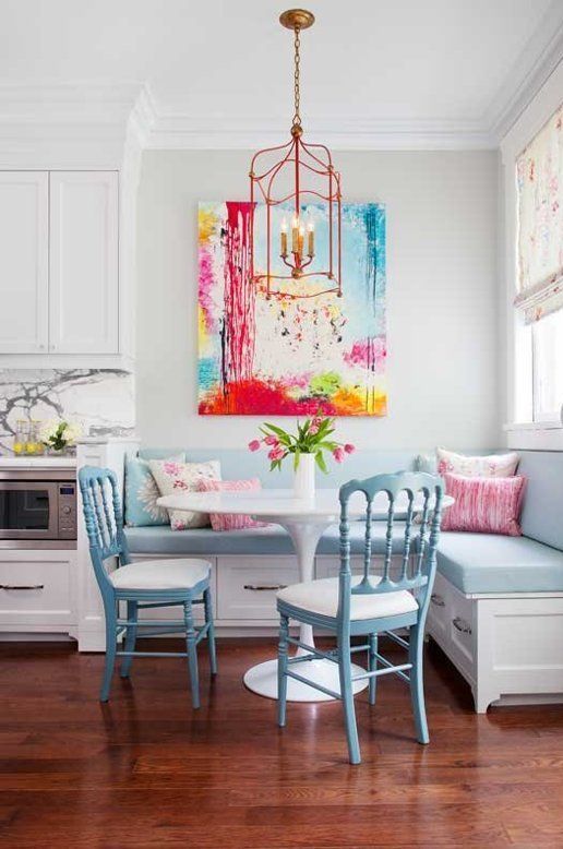 pastel breakfast nook with a bold artwork piece