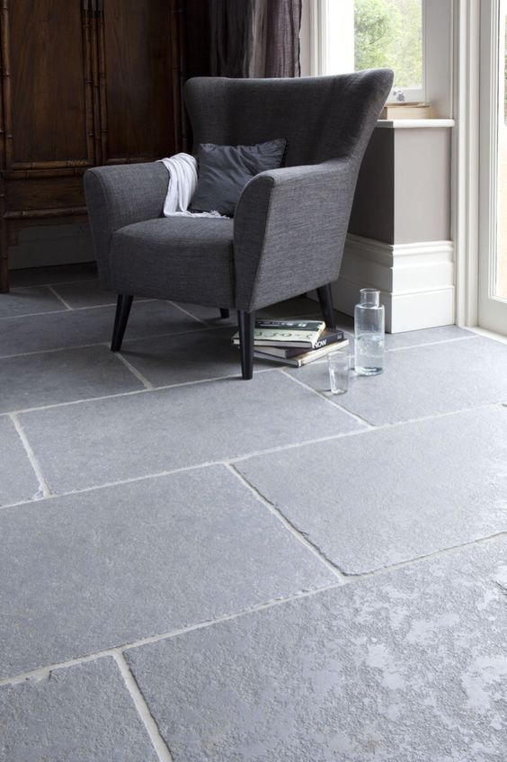 grey shade worn limestone floors for a living room