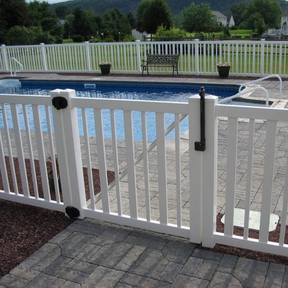 white wooden fence for a pool