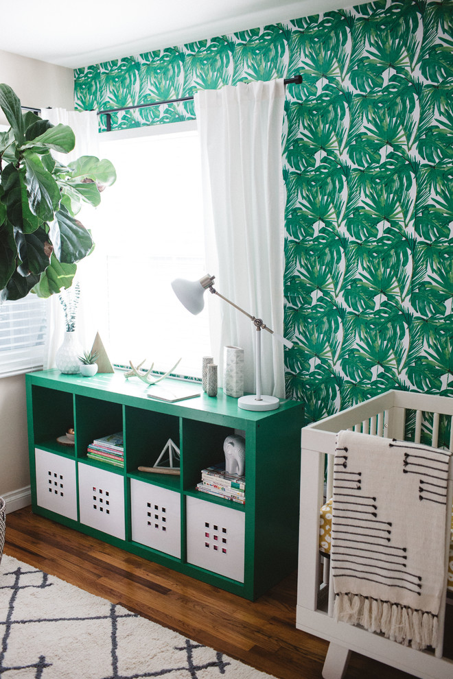 A green unit looks great with a green, patterned wallpaper in a gender neutral nursery. (Emerson Grey Designs)
