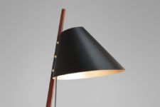 01 Billy BL floor lamp us supported by a slender rosewood stem and features a tapered matt black lampshade