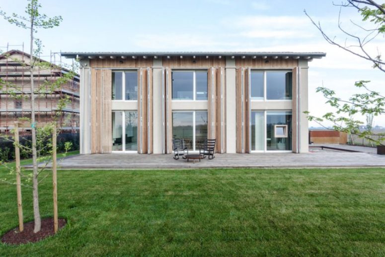 This old barn was renovated into a minimalist white house, airy and spacious